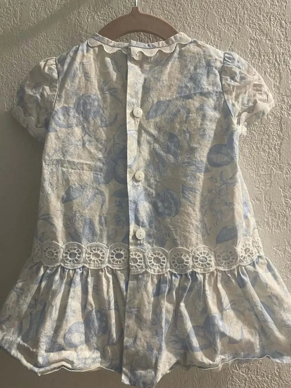 Cocote Tu Ropita Blue Floral Print Cotton Dress with Eyelet Trim and Bow Detail